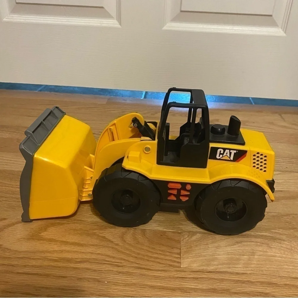 Caterpillar Job Site Machine Wheel Loader Moving Button Activated Up and Down